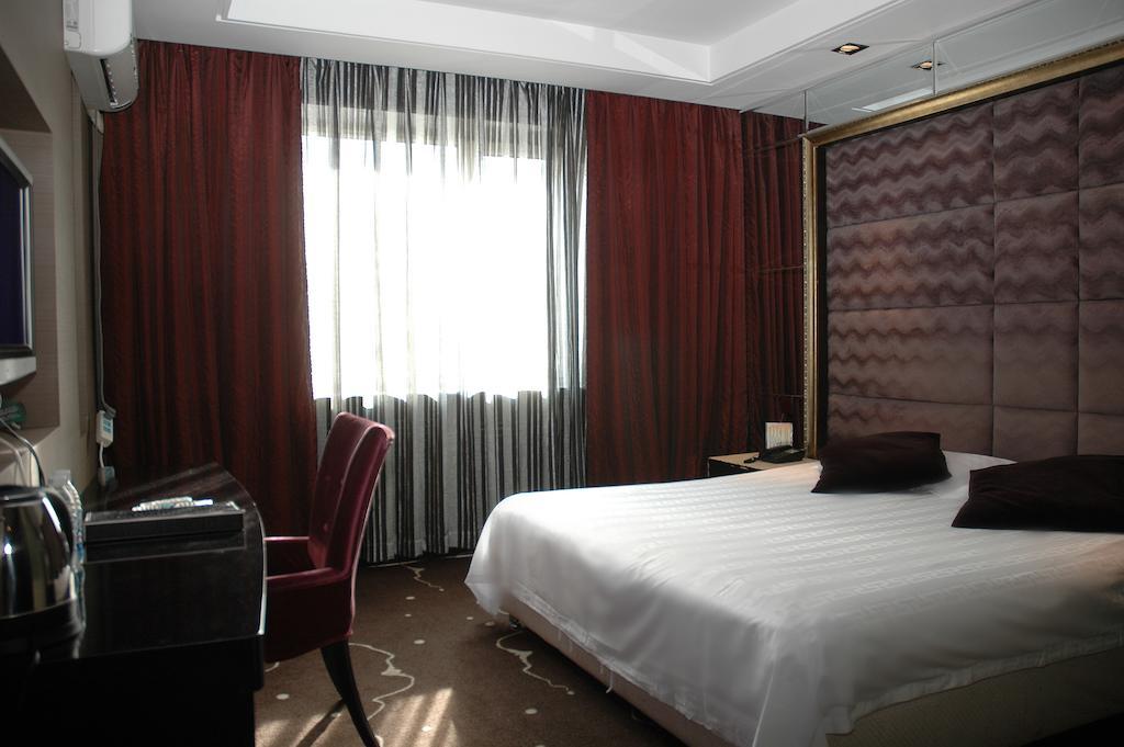 Harbin Yakelai Holiday Hotel Oda fotoğraf
