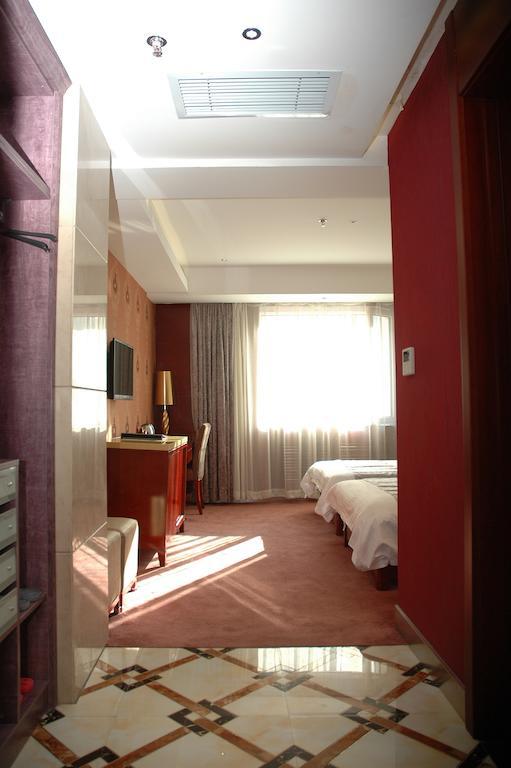 Harbin Yakelai Holiday Hotel Oda fotoğraf