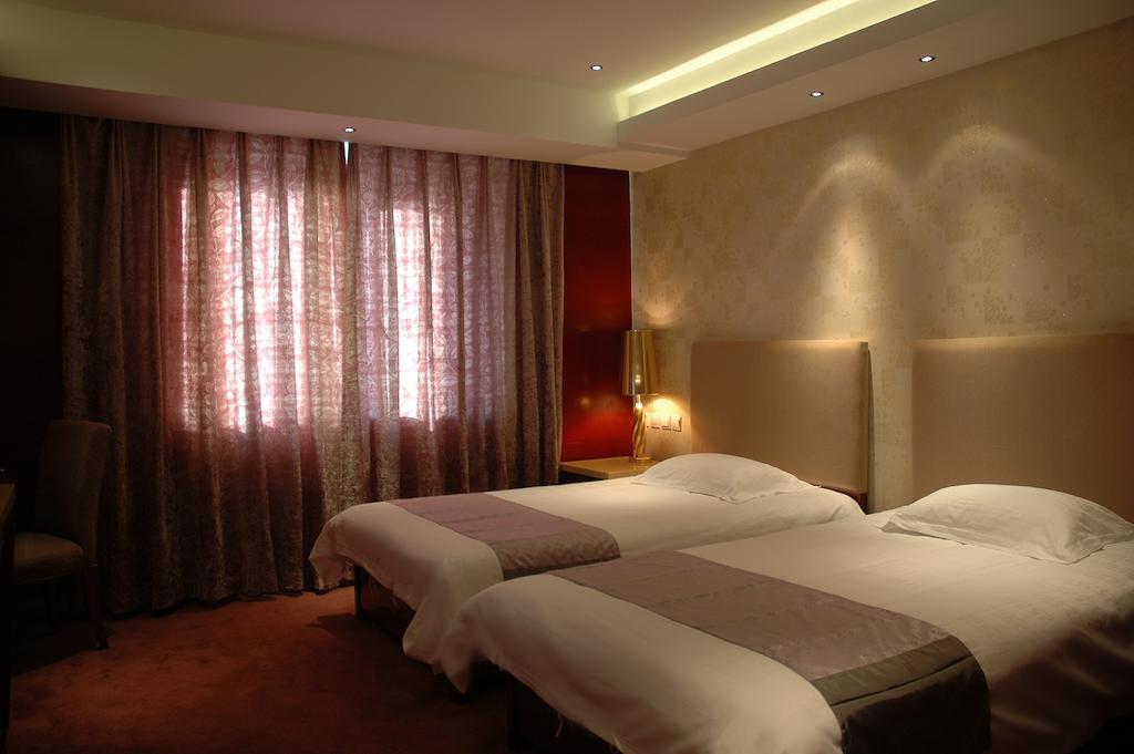 Harbin Yakelai Holiday Hotel Oda fotoğraf
